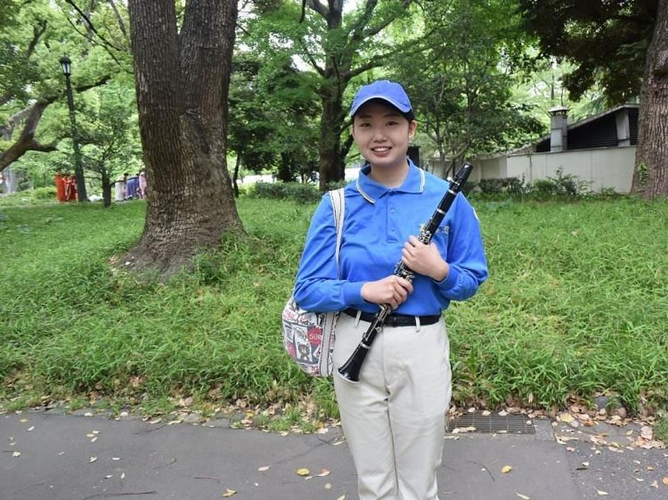 Matsumoto, članica orkestra Tian Guo Marching Band, rekla je: "Hvala Vam, Učitelju!"