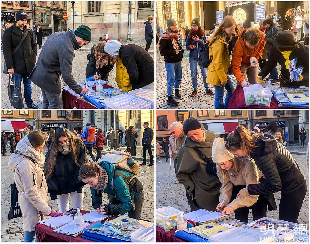 Prolaznici čitaju o Falun Dafi i potpisuju peticiju za okončanje zločina u Kini.