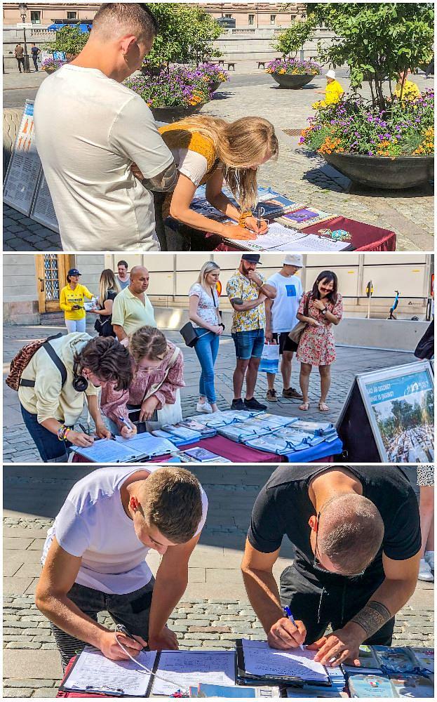 Ljudi potpisuju peticiju podrške Falun Gongu.