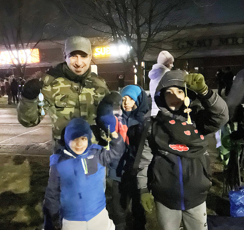 Moses svake godine vodi svoju djecu na paradu Djeda Božićnjaka u Ajax. 